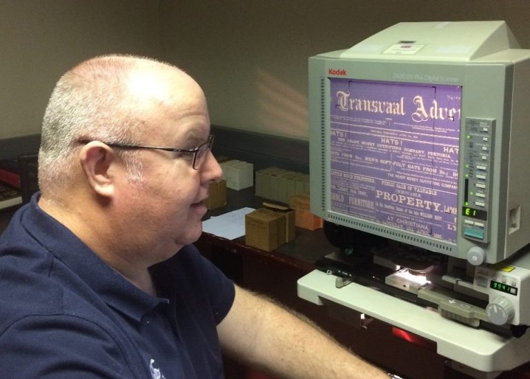 Dave Nash in front of micro fiche reader