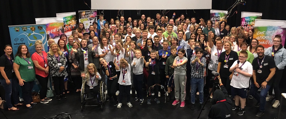 Big Resilience Get Together group photo showing a large crowd of people celebrating