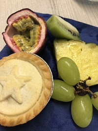 Mince pie, passion fruit, kiwi, pineapple and grapes