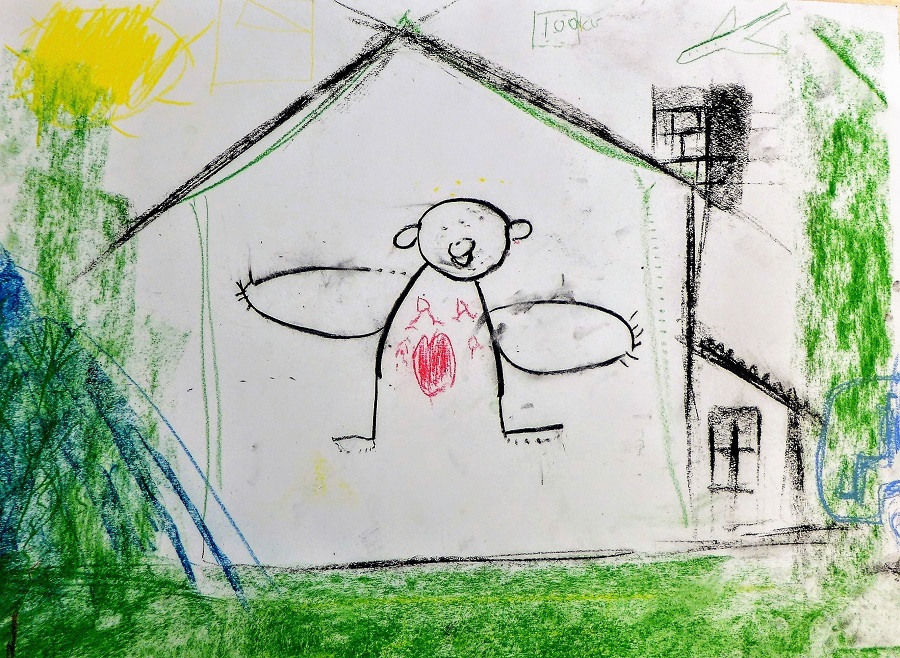 Pastel drawing by one of the young refugees showing a person with a heart inside a house surrounded by green, there is an aeroplane and the sun in the sky